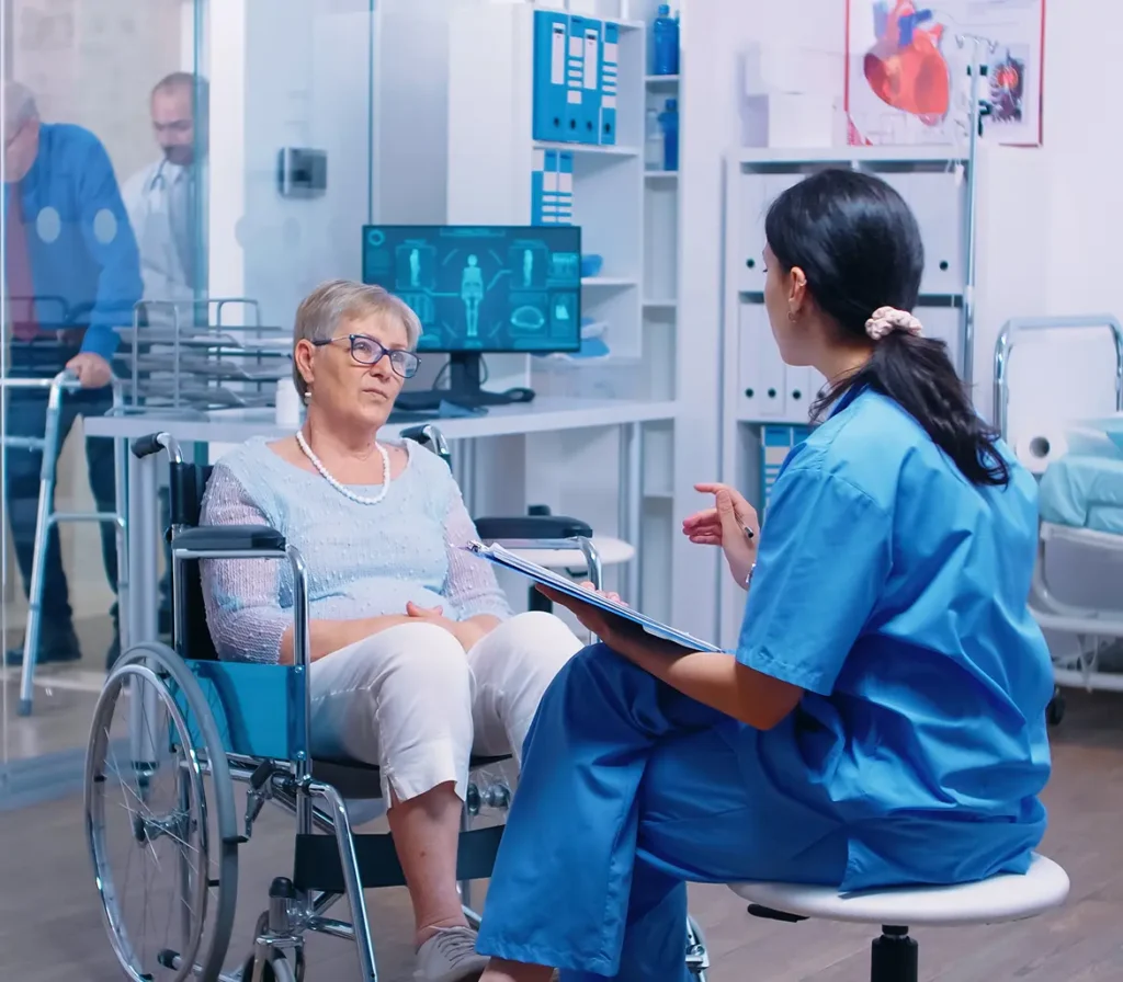 Doctor consulting with a patient in a hospital as part of ALS clinical research